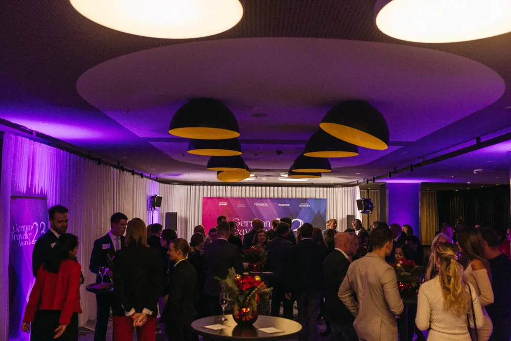 Guests at the 2023 awards night in the violet-lit event hall